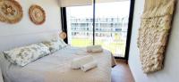 Postel nebo postele na pokoji v ubytování Apartamento Dénia Beach by DENIA COSTA