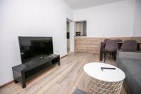 TV a/nebo společenská místnost v ubytování Paradise Apartment
