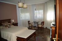 A bed or beds in a room at Villa Coco
