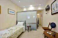 A bed or beds in a room at Sarantis Studio