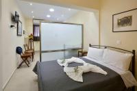 A bed or beds in a room at Sarantis Studio