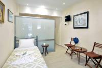 A bed or beds in a room at Sarantis Studio