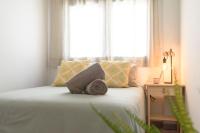 Postel nebo postele na pokoji v ubytování Tarifa Twins Apartamento de lujo con Piscina y wifi