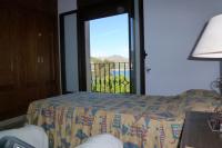 Posteľ alebo postele v izbe v ubytovaní Lake View Villa