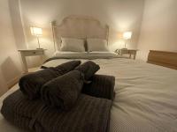 Postel nebo postele na pokoji v ubytování La Garita Bay Apartments