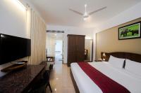 Hotel Guruvayur Darshanにあるテレビまたはエンターテインメントセンター