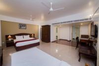 Hotel Guruvayur Darshanにあるベッド