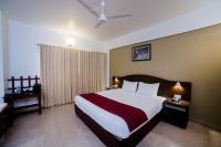 Hotel Guruvayur Darshanにあるベッド