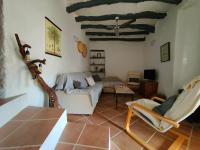 A seating area at Cortijo Vacas Gordas Villas