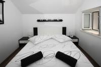 Posteľ alebo postele v izbe v ubytovaní Fokus seaview apartment