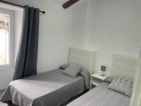 Posteľ alebo postele v izbe v ubytovaní Casa Triacastela