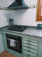 A kitchen or kitchenette at Apartaments Cel i Fusta