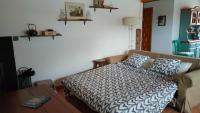 A bed or beds in a room at Apartaments Cel i Fusta