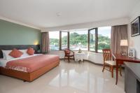 I Pavilion Hotel Phuketにあるベッド