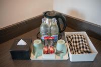I Pavilion Hotel Phuketにあるコーヒーまたはお茶