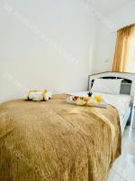 Postel nebo postele na pokoji v ubytování Milos City Center Apt. 32