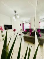 TV a/nebo společenská místnost v ubytování Milos City Center Apt. 32