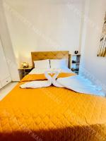Postel nebo postele na pokoji v ubytování Milos City Center Apt. 32