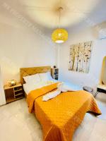 Postel nebo postele na pokoji v ubytování Milos City Center Apt. 32