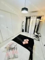 Postel nebo postele na pokoji v ubytování Milos City Center Apt. 32