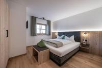 A bed or beds in a room at Mein Sonnenhof