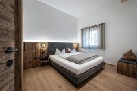 A bed or beds in a room at Mein Sonnenhof