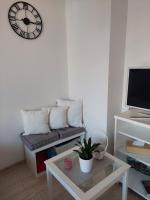Televízia a/alebo spoločenská miestnosť v ubytovaní Emily Apartment