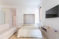 Posteľ alebo postele v izbe v ubytovaní Canaletto Apartments