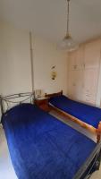 Posteľ alebo postele v izbe v ubytovaní Akrata Rose Garden Apartments I