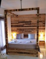 Posteľ alebo postele v izbe v ubytovaní Anemos Hotel