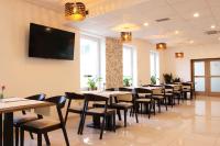 Una televisión o centro de entretenimiento en Typton hotel&spa