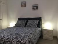 Postel nebo postele na pokoji v ubytování Apartamento Los Cristianos Tres minutos Playa las vistas