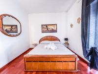 A bed or beds in a room at MYHOUSE INN PORTA NUOVA - Affitti Brevi Italia