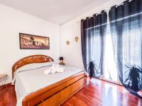 A bed or beds in a room at MYHOUSE INN PORTA NUOVA - Affitti Brevi Italia