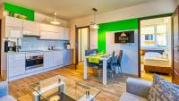 Kuchyňa alebo kuchynka v ubytovaní Apartamenty Cicha by Royal Aparts