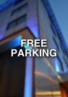a free parking sign in front of a building at Hotel Palace Verona in Verona