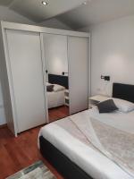 Posteľ alebo postele v izbe v ubytovaní Apartman Diana