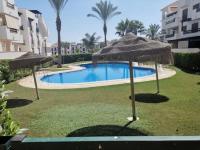 The swimming pool at or close to Apartamento Vera Playa (ALTOS NUEVA VERA)