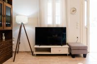 Televízia a/alebo spoločenská miestnosť v ubytovaní Matoula's House