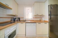 A kitchen or kitchenette at Estrella 23BH