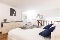 A bed or beds in a room at Campo dè Fiori Detached Apartment Eligio - Top Collection