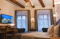 Posteľ alebo postele v izbe v ubytovaní Hotel & Apartments Ventus Rosa