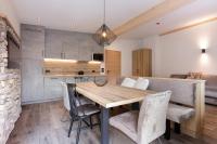 A kitchen or kitchenette at Apartments Pragser Wildsee Winklwiese