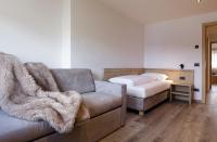 A seating area at Apartments Pragser Wildsee Winklwiese