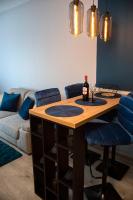 Posedenie v ubytovaní APARTAMENT ELEGANCE BLUE w Let's Sea Basen&SPA
