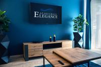 Televízia a/alebo spoločenská miestnosť v ubytovaní APARTAMENT ELEGANCE BLUE w Let's Sea Basen&SPA