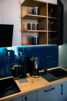 Kuchyňa alebo kuchynka v ubytovaní APARTAMENT ELEGANCE BLUE w Let's Sea Basen&SPA