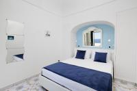 Łóżko lub łóżka w pokoju w obiekcie Estate4home - Casa Darly