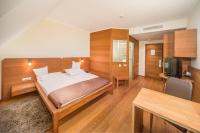Postel nebo postele na pokoji v ubytování Wellness Hotel Kager Harkány