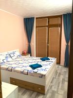 Postel nebo postele na pokoji v ubytování Апартаменти Блу Самър 1 & 2 & 3